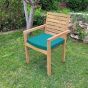 Coussin bleu canard présenté avec le fauteuil fixe de jardin en teck Tivoli