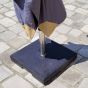 Pied de parasol Granita en granit avec roulettes