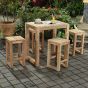 Table haute en teck massif recyclé 100 cm Toscagne présentée avec 4 tabourets en teck recyclé Toscagne